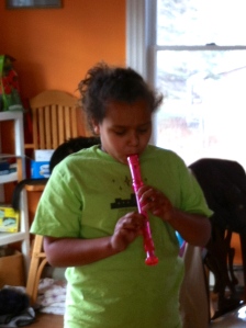 GB practicing the recorder.